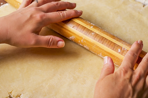 Rolling out from scratch foolproof pie crust.
