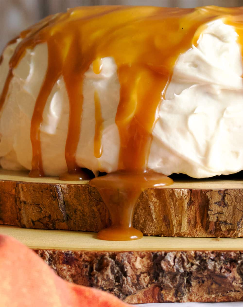 Salted Caramel Rum Sauce Dripping Down the Side of a cake.