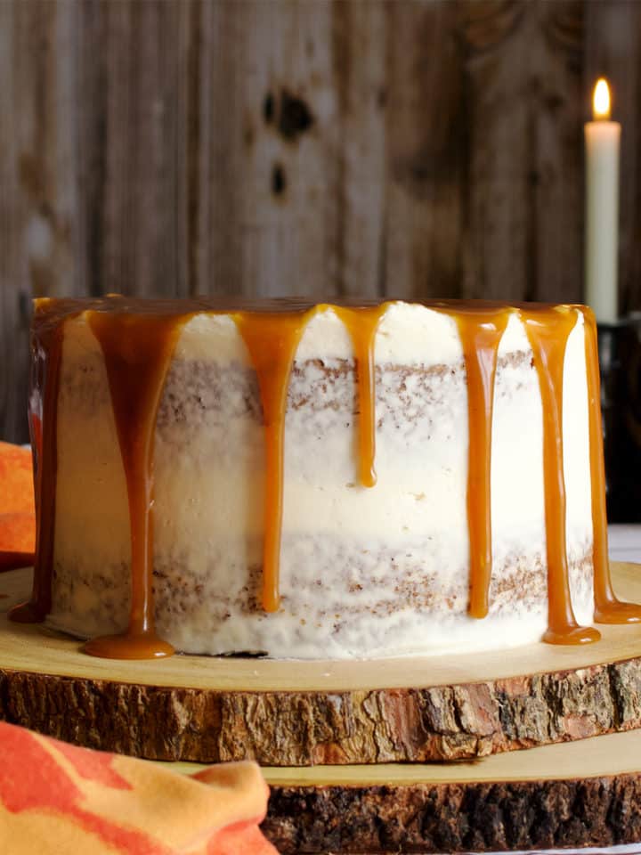 Carrot Cake Layer Cake with Cream Cheese Buttercream and Salted Caramel Rum Sauce.
