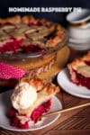 A slice of raspberry pie with a lattice crust topped with a scoop of vanilla ice cream.