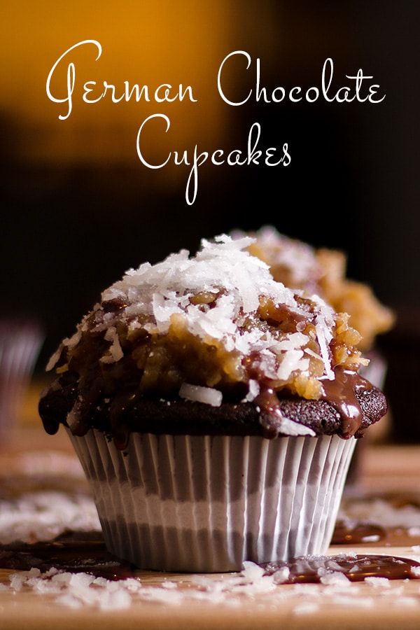 A German Chocolate Cupcake covered in coconut and chocolate ganache.