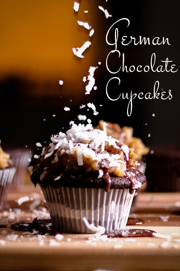 Sprinkling coconut over the top of a German Chocolate Cupcake.