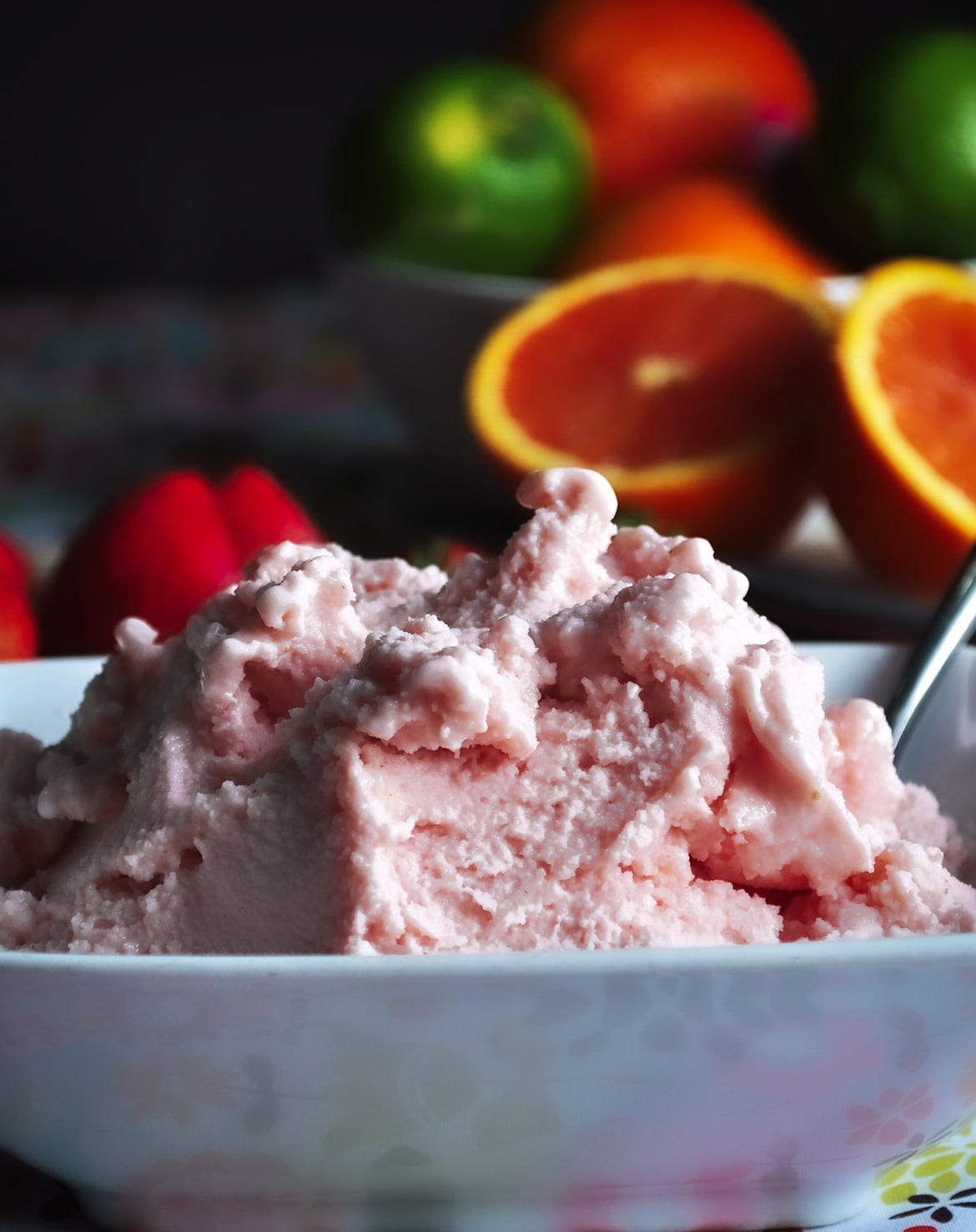 A bowl of healthy strawberry frozen yogurt.