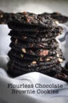 A stack of flourless chocolate brownie cookies.