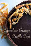 A Chocolate Orange Truffle Tart with candied orange peel.