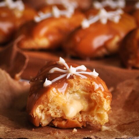Mini Butterscotch Eclairs filled with pastry cream.