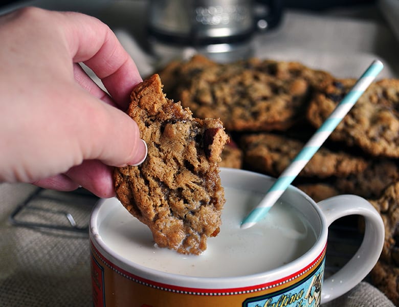 Dipping a chewy oatmeal raisin cookie in milk. 