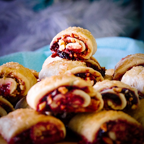 A tray of cherry almond rugelach cookies.