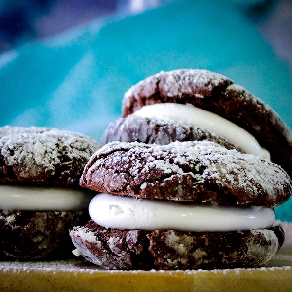 A plate of marshmallow chocolate crinkle cookies.