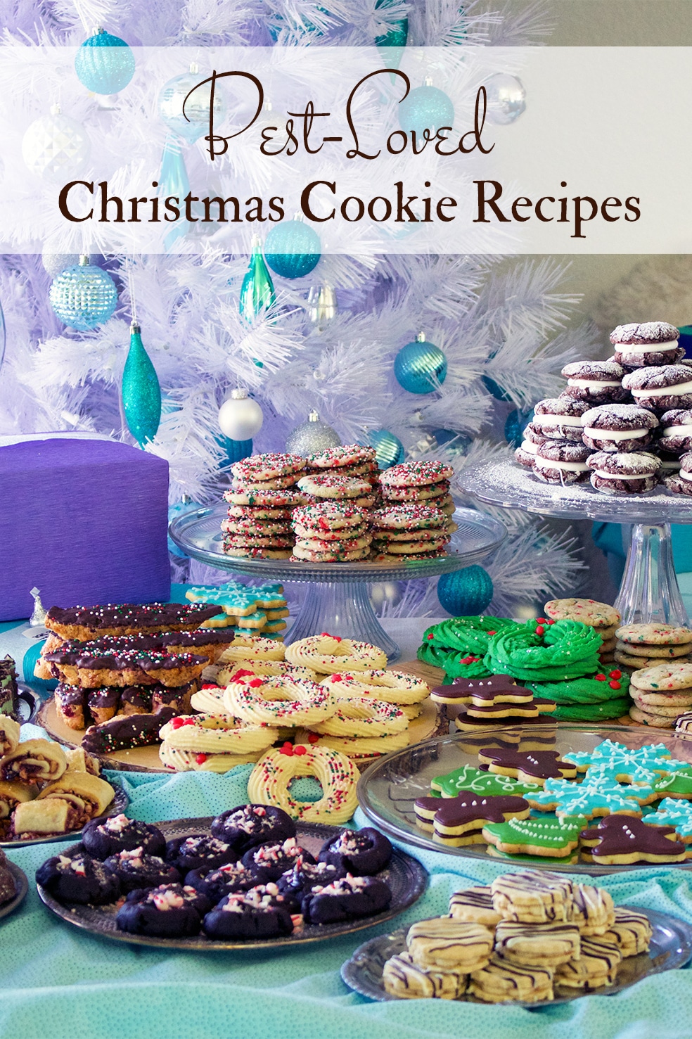 A table with stacks of 11 different kinds of Christmas Cookies