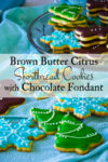 Chocolate frosted brown butter citrus shortbread Christmas cookies.