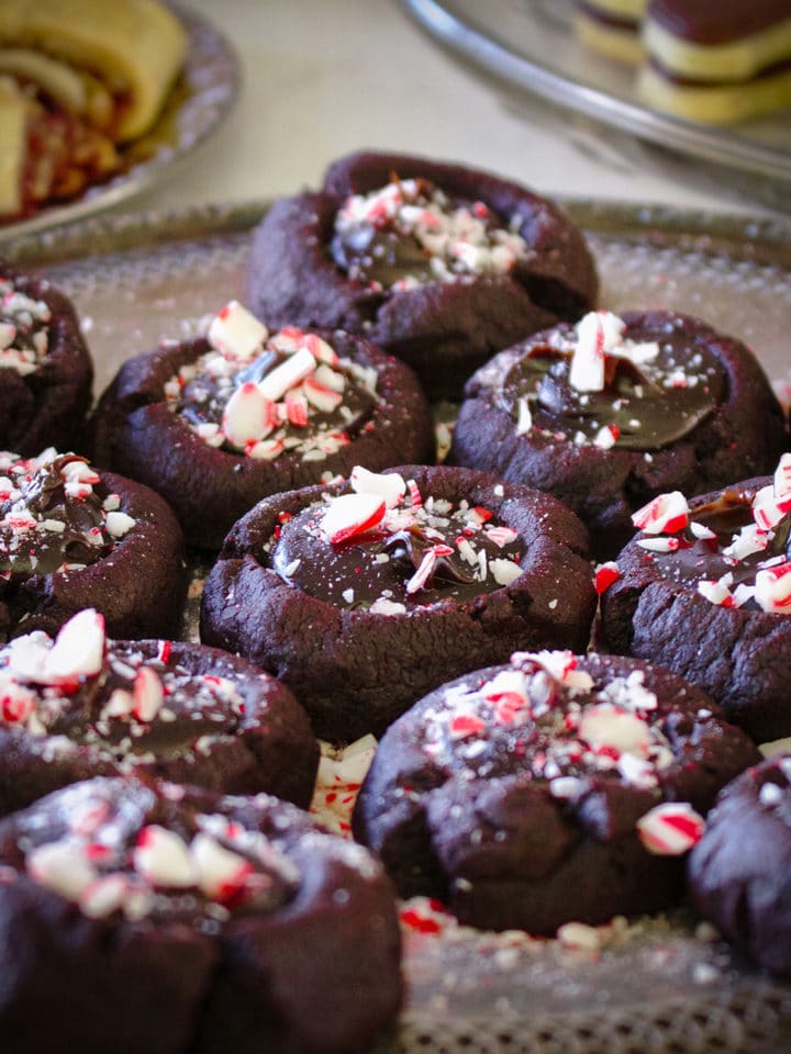 A tray of three peppermint hot fudge thumbprint cookies.