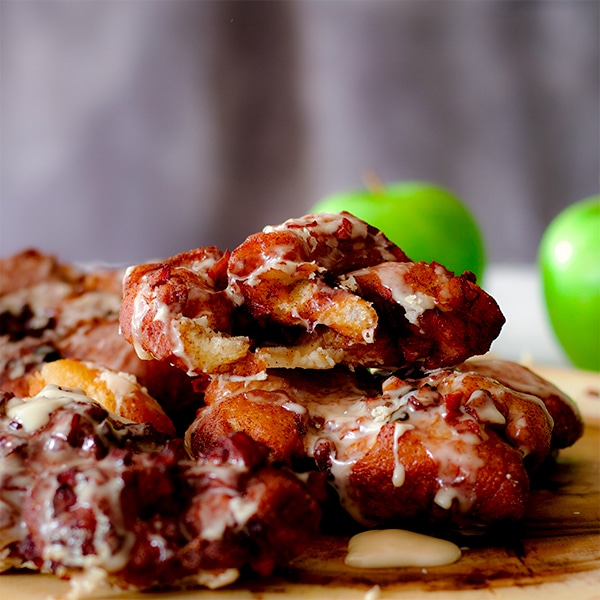 Homemade apple fritters with maple glaze.