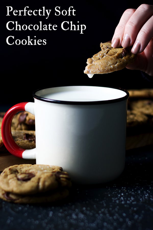 Dipping a soft chocolate chip cookie in milk.