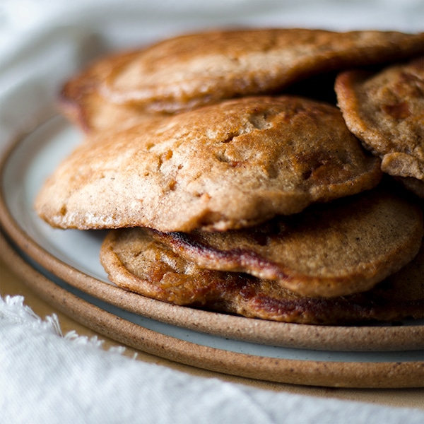 A plate of Apple Cinnamon Pancakes made with buttermilk and applesauce.