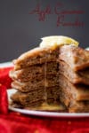 A stack of Apple Cinnamon Pancakes with butter.