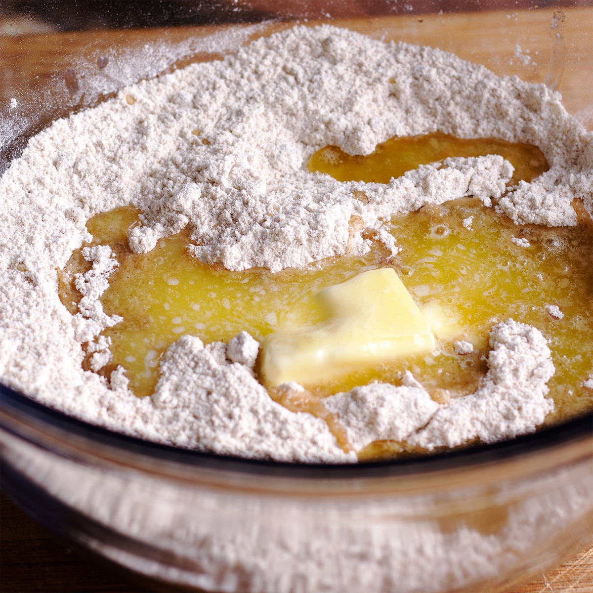 Melted butter and flour in a glass bowl.