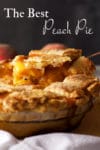 Serving a slice of peach pie with a lattice crust.