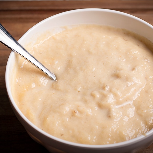 Mashed bananas and pineapple, blended together to add to hummingbird cupcake batter.