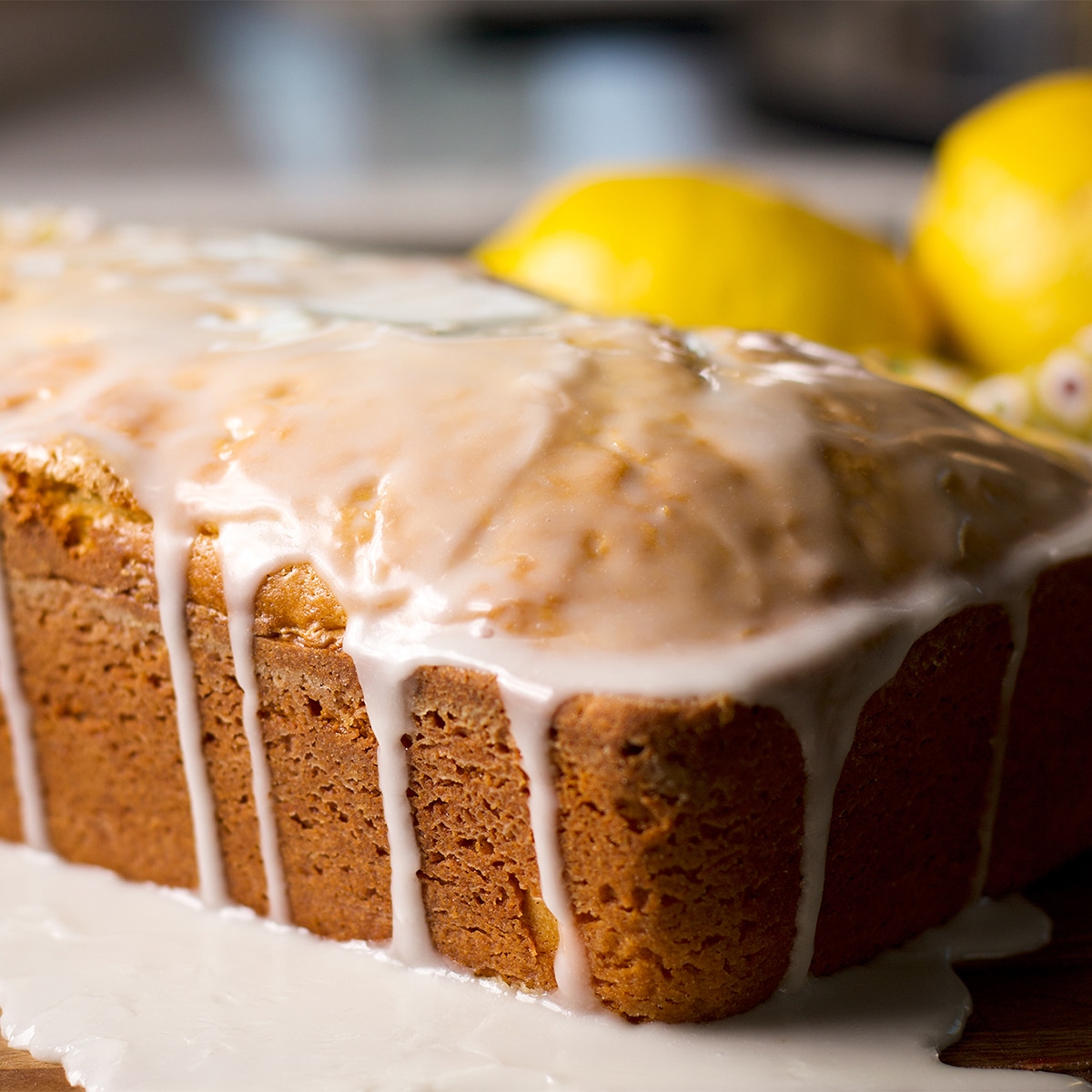 A lemon loaf cake covered in tart lemon glaze.