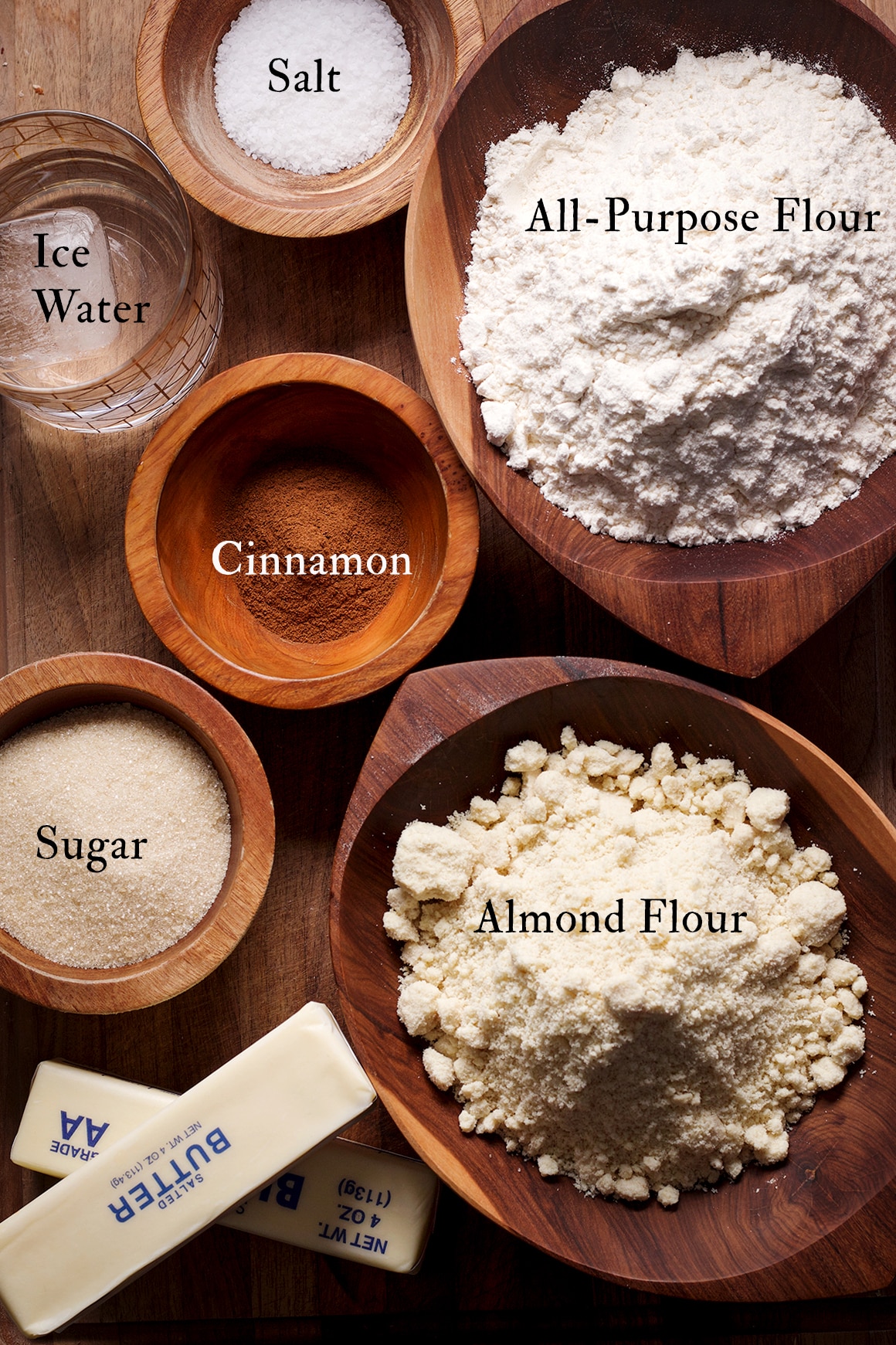 All the ingredients needed to make toasted almond pie crust dough.