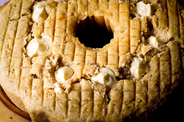 A banana bundt cake that's been filled with banana cream filling.