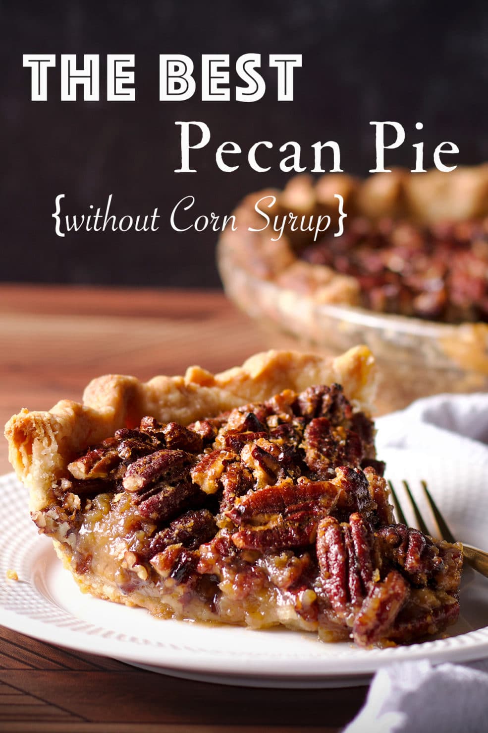 A slice of Pecan Pie made without corn syrup on a white plate.