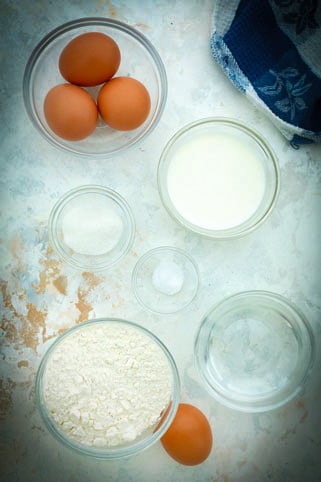 A photo with all the ingredients needed to prepare choux pastry.