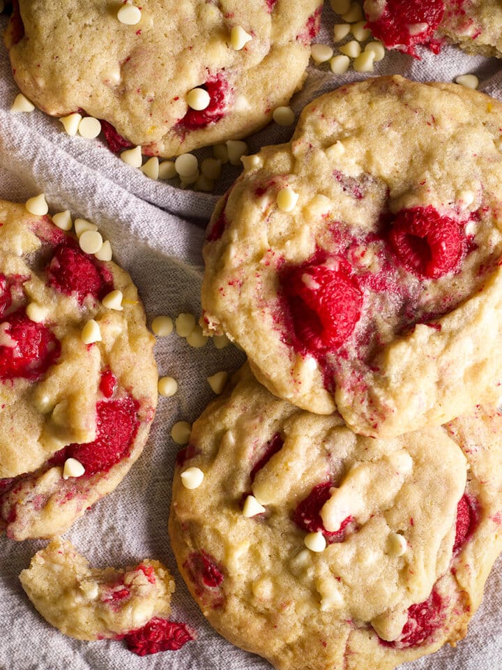 A tray filled with white chocolate raspberry cookies.