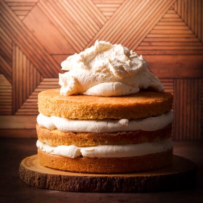 Three layers of orange olive oil cake filled with mascarpone frosting.